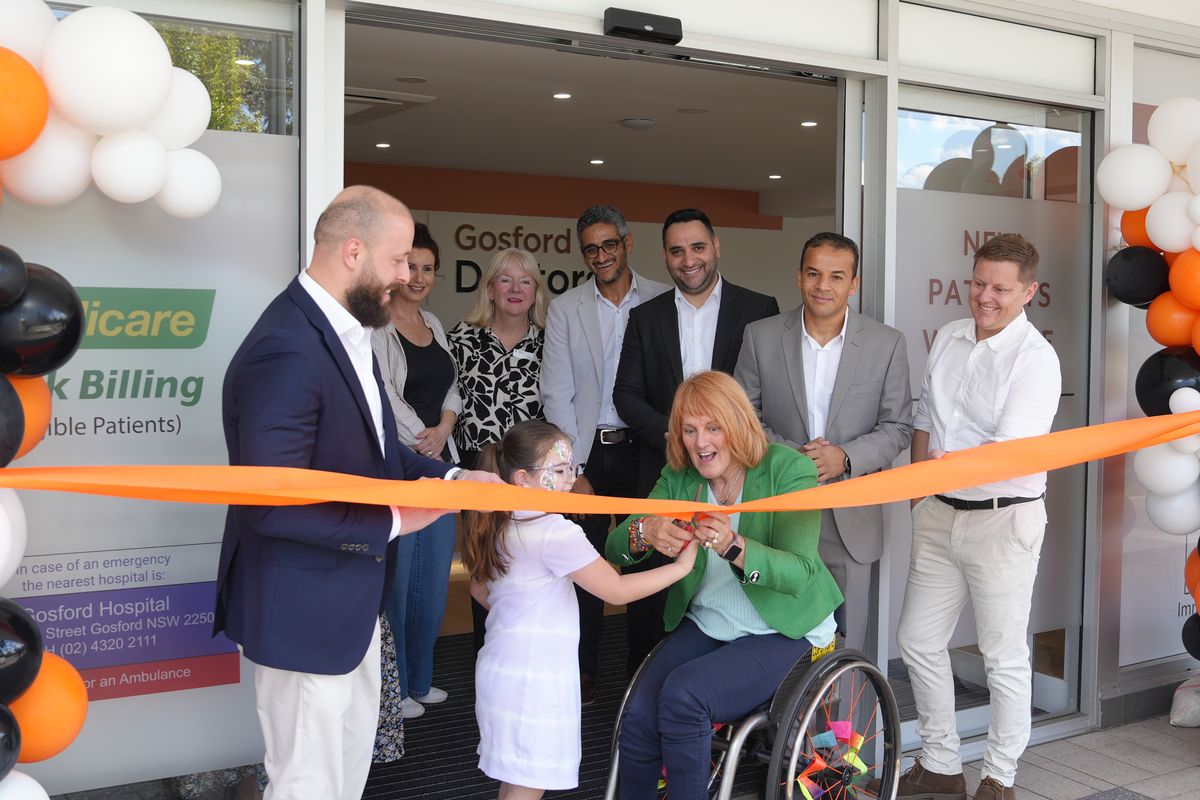 The ribbon being cut on opening day at Gosford Doctors, West Gosford