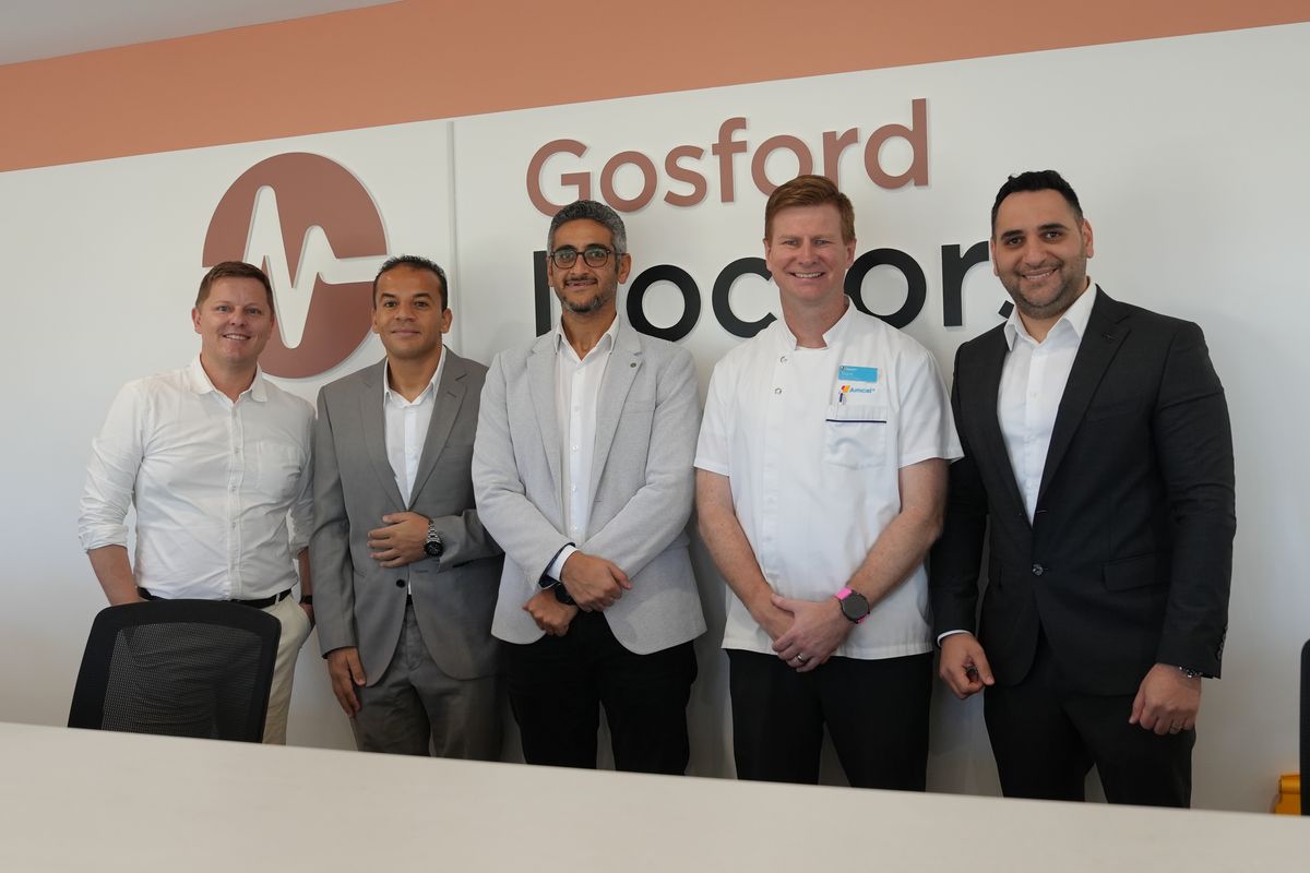 Neighbouring health providers at the Gosford Doctors reception desk on opening day