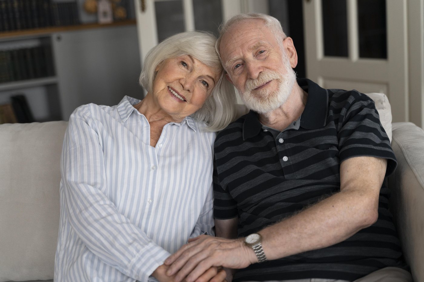 Older adults: an older couple sitting together at home